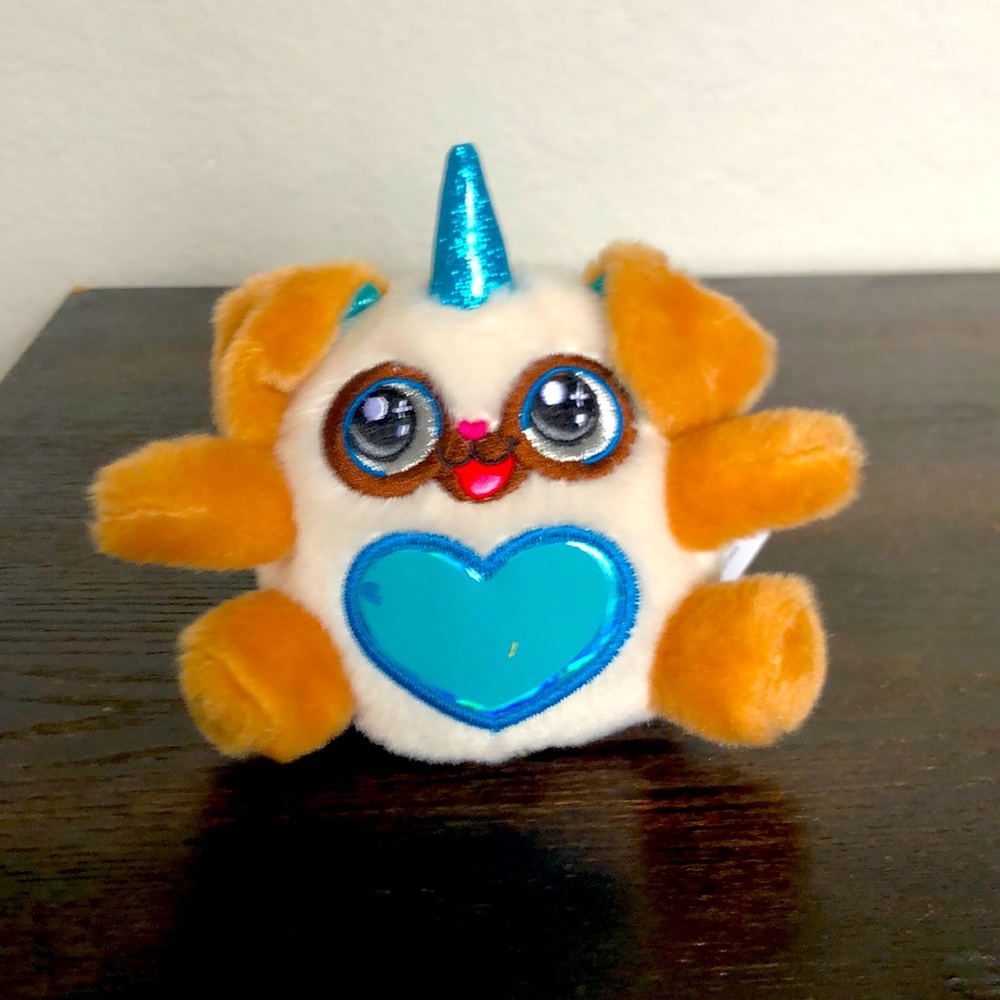 Rainbow corns sparkle heart stop toy